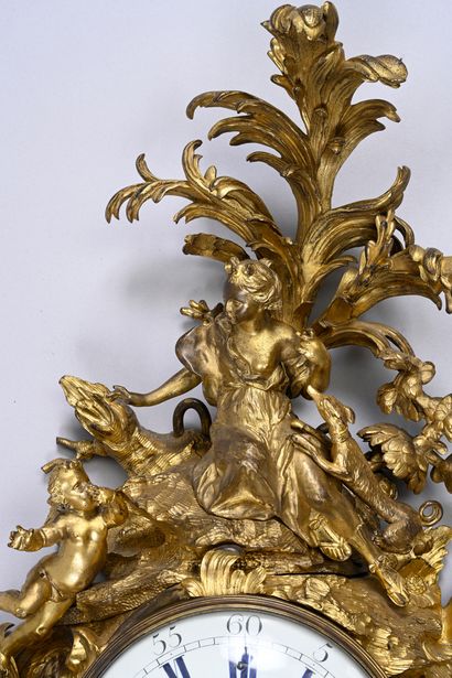 Large ormolu cartel and barometer with asymmetrical...