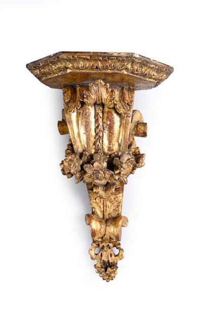 Pair of carved and gilded wood wall brackets...