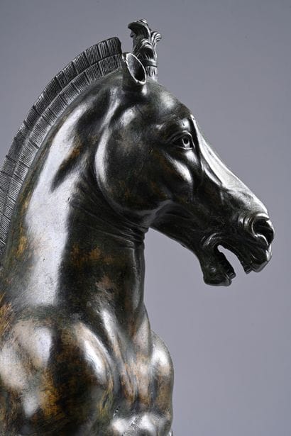 Prancing horse in bronze with brown and green...