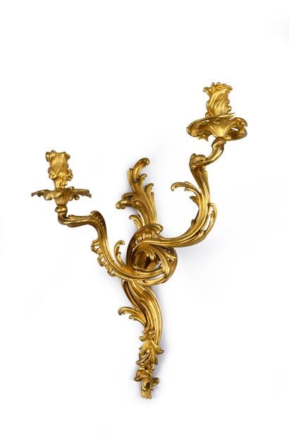 Suite of four large sconces in 
chased and...