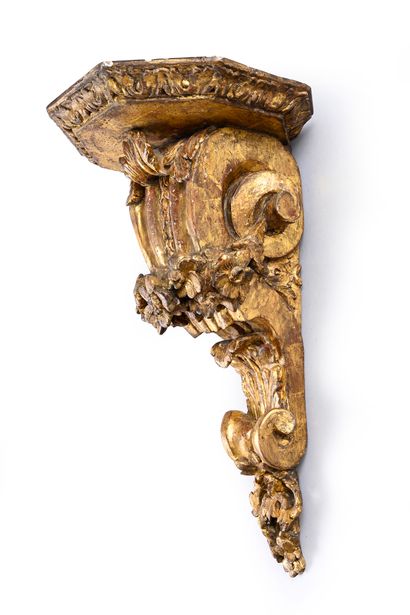 Pair of carved and gilded wood wall brackets...