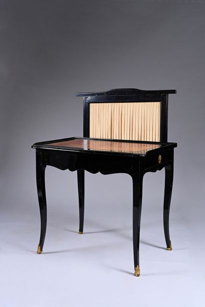 Screen-shaped writing table in blackened...