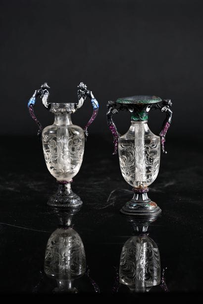 Two cut rock crystal vases with scrolls and...
