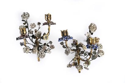 Pair of iron and gilt bronze sconces with...