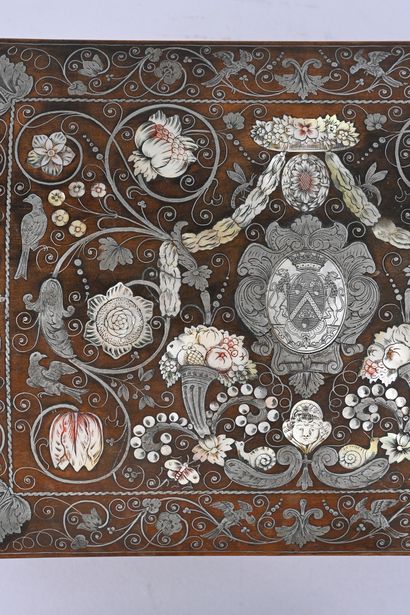 Wooden case inlaid with silver and mother-of-pearl....