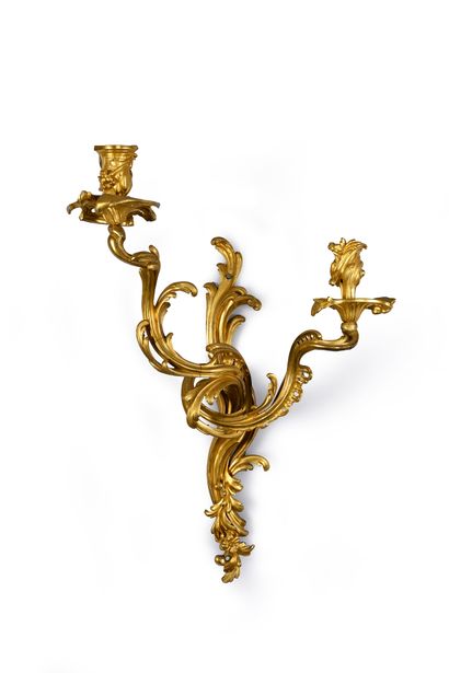 Suite of four large sconces in 
chased and...