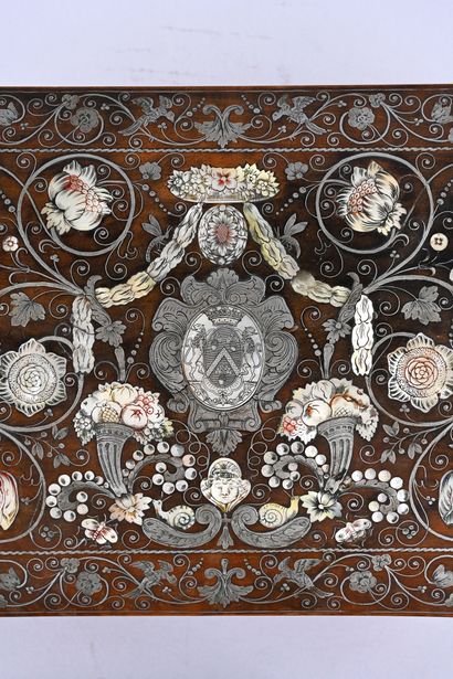 Wooden case inlaid with silver and mother-of-pearl....