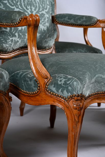 Suite of five armchairs in molded and carved...