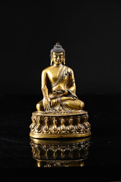 TIBET, 16th century
Gilded bronze subject...