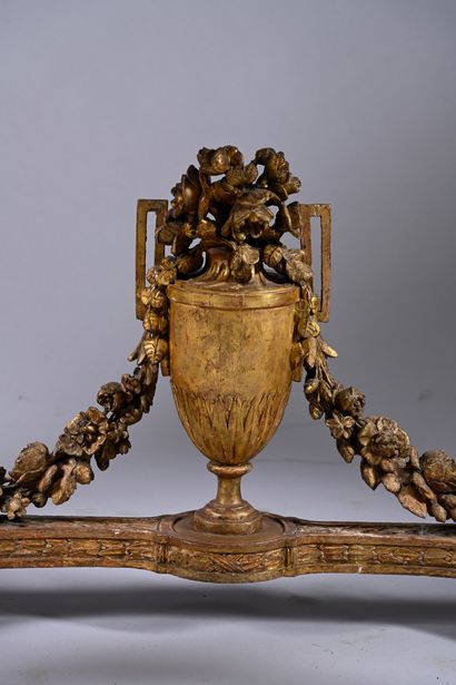 Carved and gilded wood console decorated...