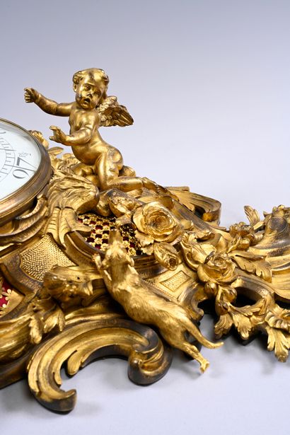 Large ormolu cartel and barometer with asymmetrical...