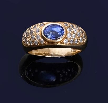 Bague jonc en or 18k (750e), centrée d'un...