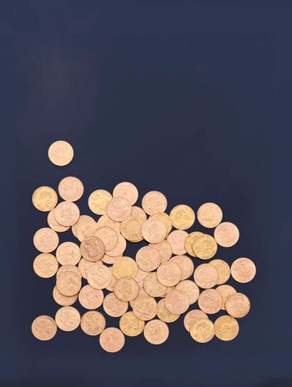 70 pièces de 20 francs en or jaune 900°°,...