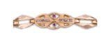 Bracelet en or a maillons alternes, serti...