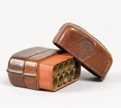 Petite cartouchière en cuir à double ouverture...