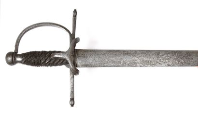 Epée d'arme. Garde à une branche rejoignant...