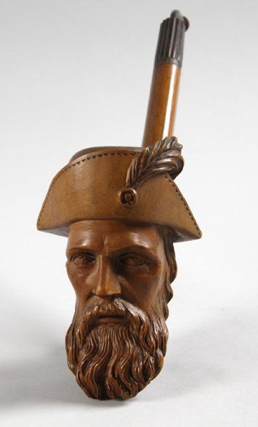Belle pipe en buis sculptée représentant...