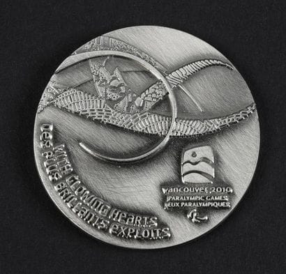 Médaille officielle de participant des Xème...