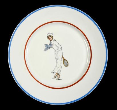 Ensemble de 16 assiettes en céramique à décor...