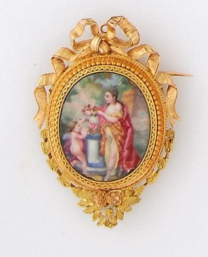 Broche porte-souvenir en trois tons d'or,...