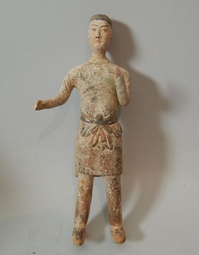 Palefrenier en terre cuite. H : 31,5 cm (Restaurations)....