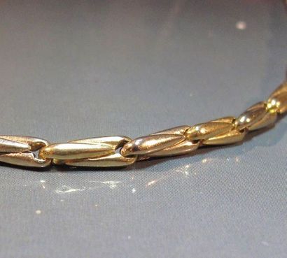 CARTIER
Sautoir en or deux tons 18K maillons...