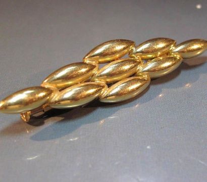 CARTIER
Broche clip en or jaune 18K modèle...