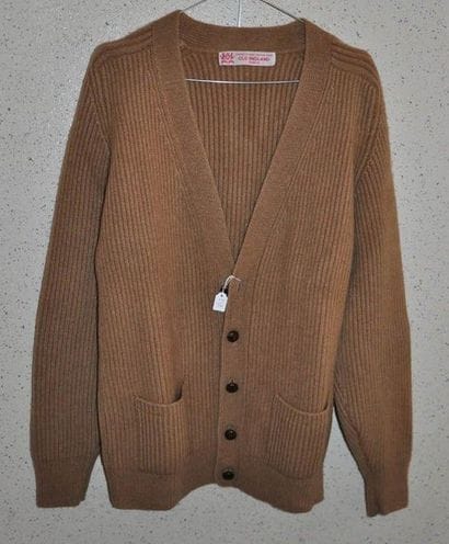 OLD ENGLAND
Un pull homme en poil de chameau,...
