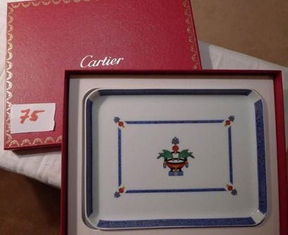 CARTIER
Un vide-poche porcelaine 'maison...