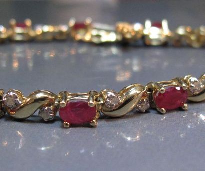 Bracelet rivière en or jaune 14 K serti de...