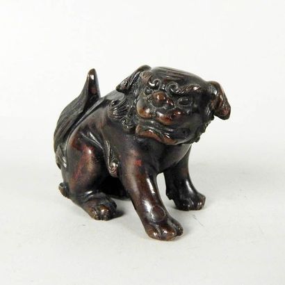 Poids de lettré en bronze en forme de shishi...