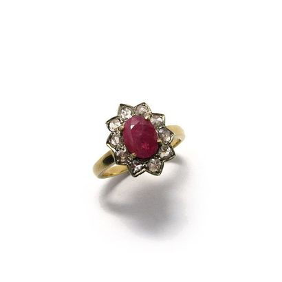 BAGUE en or jaune 18k (750/°°) et argent...