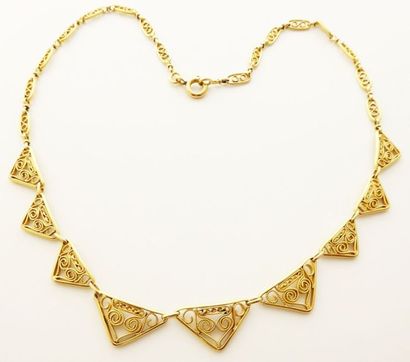 Collier en or 18k (750/°°) draperie filigranée...