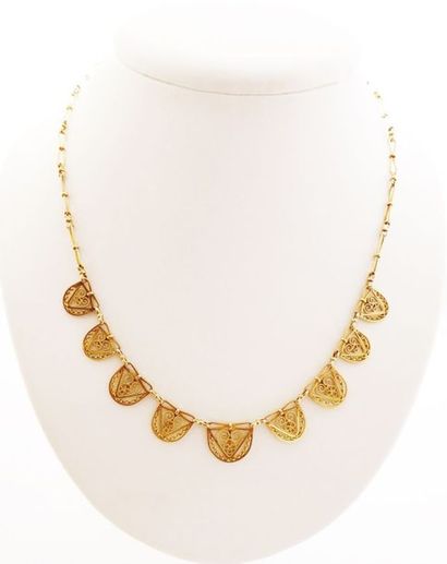 Collier en or 18k (750/°°) draperie filigrané.
Poids...
