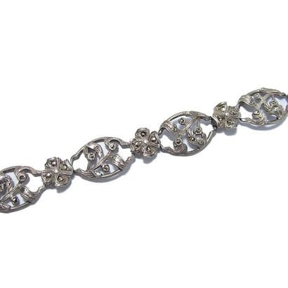 BRACELET articulé en argent (925/°°), composé...