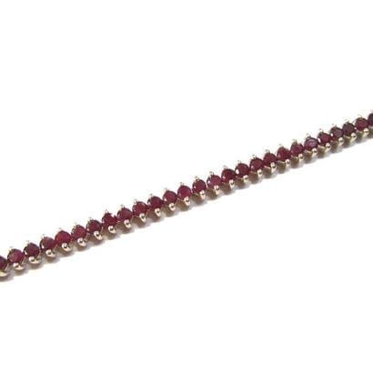 BRACELET articulé en argent (925/°°), ornée...