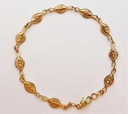 Bracelet en or 750/°° maille filigrane, longueur...