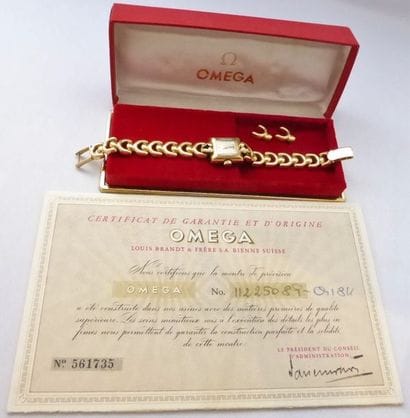 Montre Oméga femme en or 750/°° dans son...