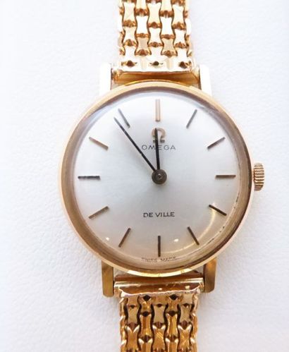 Montre en or 750/°°Oméga de ville, bracelet...