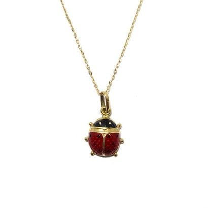 COLLIER en or jaune 18k (750/°°), tour de...