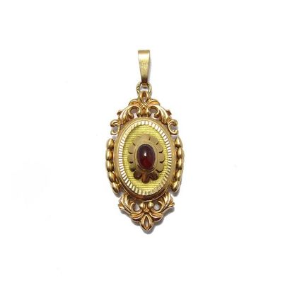 PENDENTIF ouvrant en or jaune 18k (750/°°)...