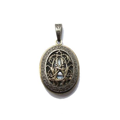 PENDENTIF ouvrant en or jaune 18k (750/°°)...