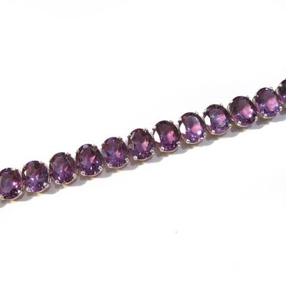 BRACELET articulé en argent (925/°°), ornée...