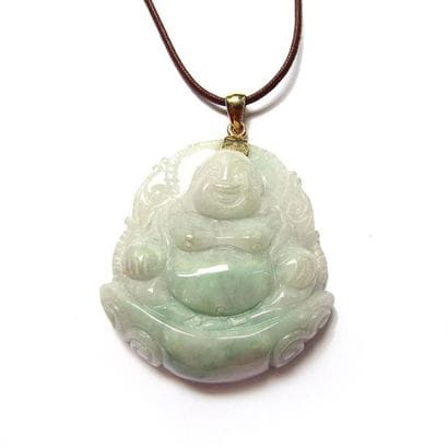 PENDENTIF en jadéïte sculptée figurant un...