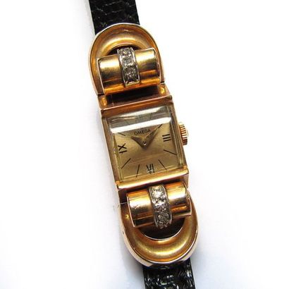OMEGA
MONTRE BRACELET de dame en or jaune...