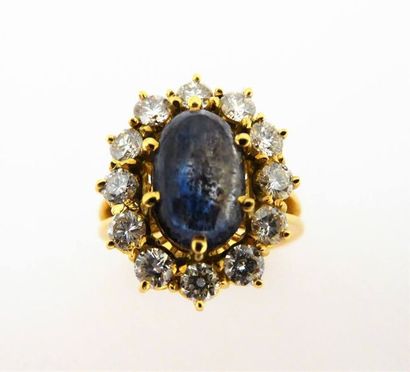 BAGUE pompadour en or 18k, 750/°° sertie...