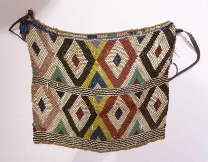 Cache-sexe. Kirdi, Cameroun. 

Perles de...