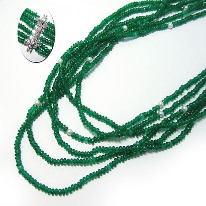 SAUTOIR composé de 6 rangs de perles d'émeraudes...
