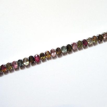 BRACELET articulé en argent (925/°°), orné...