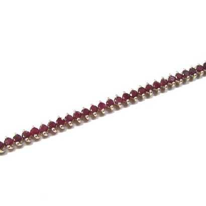 BRACELET articulé en argent (925/°°), ornée...